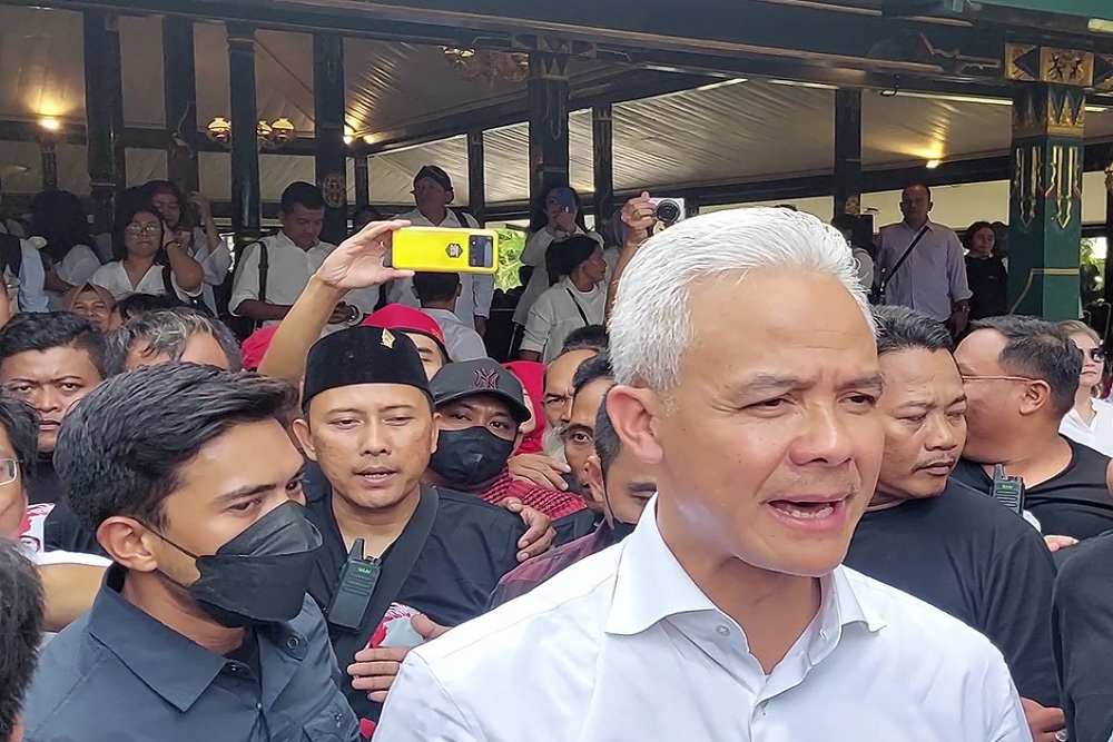 Calon Presiden nomor urut 3, Ganjar Pranowo, mengutarakan keraguan terhadap anggapan bahwa Presiden Joko Widodo (Jokowi) mendukung rivalnya, (Sumber foto: Kompas.com)