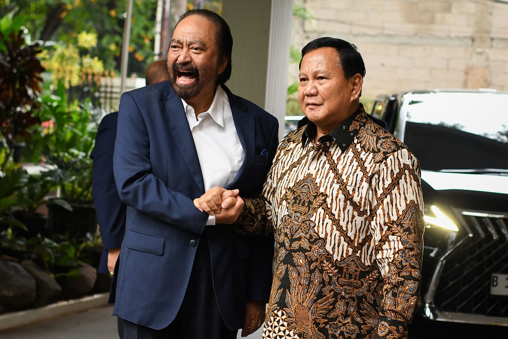 Partai NasDem akhirnya memberikan penjelasan mengenai ketidakhadiran Ketua Umum mereka, Surya Paloh, dalam acara pembubaran Timnas AMIN (Sumber foto : Harian Jogja)